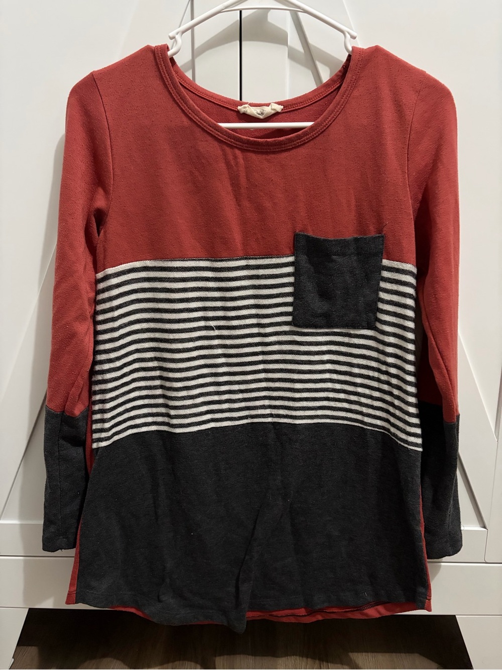 Women’s Rust Red and Black Striped Pocket Knit Top